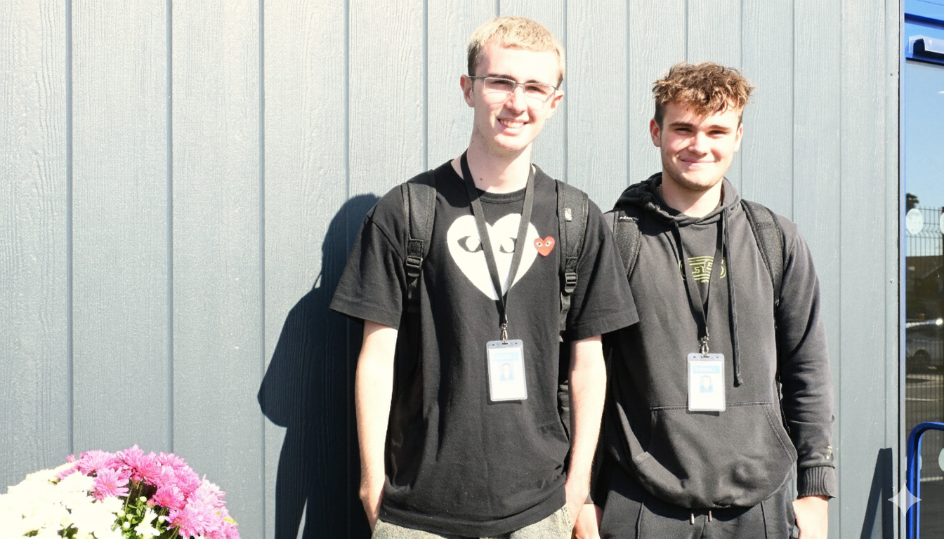 head students outside school building